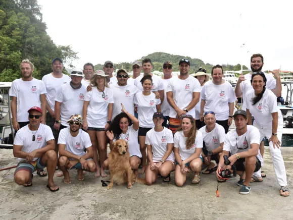 Group of divers in a boat of Fish 'n Fins in Palau during Shark Week Palau