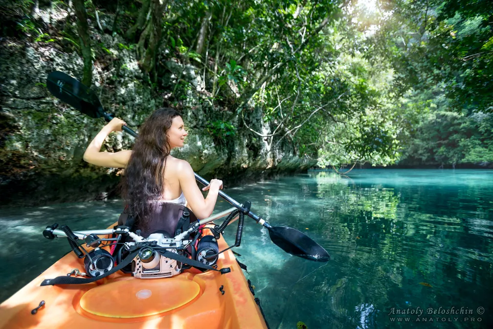 lady kayaking through the mangroves in Palau